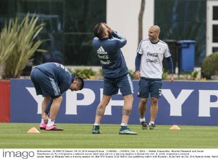 (151006) -- EZEIZA, Oct. 5, 2015 -- Matias Kranevitter, Nicolas Otamendi and Javier Mascherano (L-R) of Argentina s national soccer team take part in a training session in Ezeiza City Oct. 5, 2015. Argentina s national soccer team on Monday held a training session for the FIFA Russia 2018 World Cup qualifying match with Ecuador, to be held on Oct. 8 in Buenos Aires. Martin Zabala) (da) (sp) (SP)ARGENTINA-EZEIZA-SOCCER-TRAINING e MARTINxZABALA 