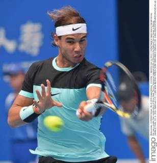 (151006) -- BEIJING, Oct. 6, 2015 -- Rafael Nadal of Spain returns the ball during the men s singles first round match of China Open Tennis Tournament against Wu Di of China at the National Tennis Center in Beijing, capital of China, Oct. 6, 2015. Nadal won 2-0. ) (SP)CHINA-BEIJING-TENNIS-CHINA OPEN-MEN S SINGLES (CN) LixWen 