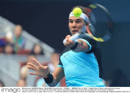 (151006) -- BEIJING, Oct. 6, 2015 -- Rafael Nadal of Spain returns the ball during the men s singles first round match of China Open Tennis Tournament against Wu Di of China at the National Tennis Center in Beijing, capital of China, Oct. 6, 2015. Nadal won 2-0. ) (SP)CHINA-BEIJING-TENNIS-CHINA OPEN-MEN S SINGLES (CN) XingxGuangli 