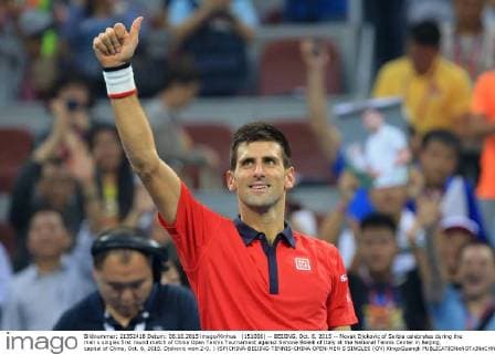(151006) -- BEIJING, Oct. 6, 2015 -- Novak Djokovic of Serbia celebrates during the men s singles first round match of China Open Tennis Tournament against Simone Bolelli of Italy at the National Tennis Center in Beijing, capital of China, Oct. 6, 2015. Djokovic won 2-0. ) (SP)CHINA-BEIJING-TENNIS-CHINA OPEN-MEN S SINGLES (CN) XingxGuangli 