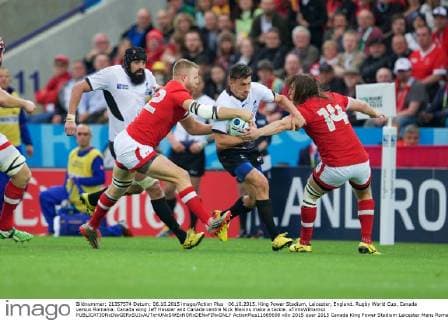 06.10.2015. King Power Stadium, Leicester, England. Rugby World Cup. Canada versus Romania. Canada wing Jeff Hassler and Canada centre Nick Blevins make a tackle. xTimxWilliamsx  ActionPlus11669698