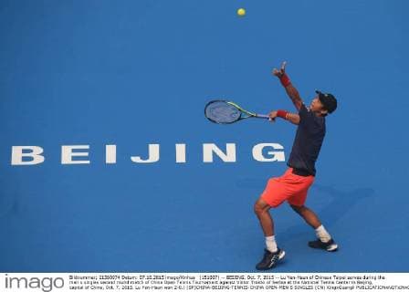 (151007) -- BEIJING, Oct. 7, 2015 -- Lu Yen-Hsun of Chinese Taipei serves during the men s singles second round match of China Open Tennis Tournament against Viktor Troicki of Serbia at the National Tennis Center in Beijing, capital of China, Oct. 7, 2015. Lu Yen-Hsun won 2-0.) (SP)CHINA-BEIJING-TENNIS-CHINA OPEN-MEN S SINGLES (CN) XingxGuangli 