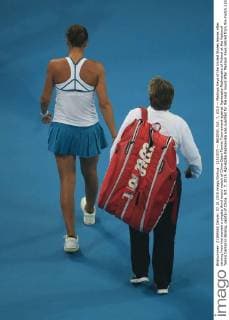 (151007) -- BEIJING, Oct. 7, 2015 -- Madison Keys of the United States leaves after retiring from the women s singles third round match of China Open Tennis Tournament against Agnieszka Radwanska of Poland at the National Tennis Center in Beijing, capital of China, Oct. 7, 2015. Agnieszka Radwanska was qualified for the next round after Madison Keys retired from the match.) (SP)CHINA-BEIJING-TENNIS-CHINA OPEN-WOMEN S SINGLES (CN) XingxGuangli 