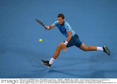 (151007) -- BEIJING, Oct. 7, 2015 -- Vasek Pospisil of Canada returns the ball during the men s singles second round match of China Open Tennis Tournament against Rafael Nadal of Spain at the National Tennis Center in Beijing, capital of China, Oct. 7, 2015. )(wll) (SP)CHINA-BEIJING-TENNIS-CHINA OPEN-MEN S SINGLES (CN) XingxGuangli 