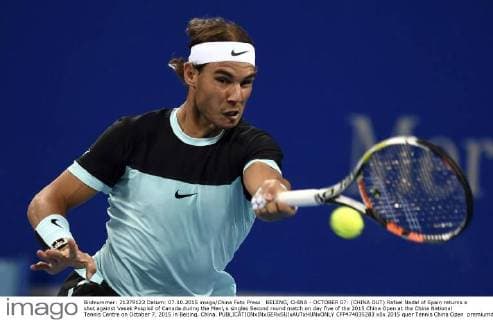 BEIJING, CHINA - OCTOBER 07: (CHINA OUT) Rafael Nadal of Spain returns a shot against Vasek Pospisil of Canada during the Men s singles Second round match on day five of the 2015 China Open at the China National Tennis Centre on October 7, 2015 in Beijing, China.  CFP474035283 