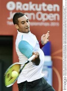 Kyrgios advances to quarterfinals at Japan Open tennis Nick Kyrgios of Australia returns a forehand during a match against Roberto Bautista Agut of Spain at the Japan Open tennis championships in Tokyo on Oct. 8, 2015. Kyrgios cruised to a 6-4, 6-2 win to advance to the quarterfinals. 