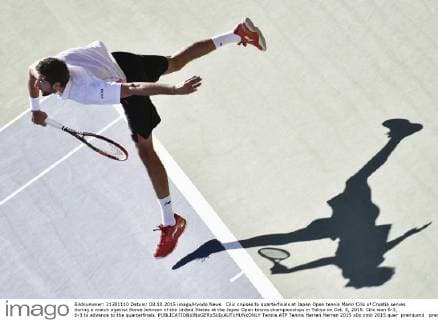 Cilic cruises to quarterfinals at Japan Open tennis Marin Cilic of Croatia serves during a match against Steve Johnson of the United States at the Japan Open tennis championships in Tokyo on Oct. 8, 2015. Cilic won 6-3, 6-3 to advance to the quarterfinals. 