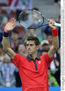(151008) -- BEIJING, Oct. 8, 2015 -- Novak Djokovic of Serbia celebrates his victory over Zhang Ze of China during the men s singles second round match at the China Open tennis tournament in Beijing, China, Oct. 8, 2015. Djokovic was qualified for the next round after beating Zhang 2-0. ) (SP)CHINA-BEIJING-TENNIS-CHINA OPEN-MEN S SINGLES-DJOKOVIC XingxGuangli 