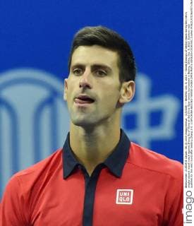 (151008) -- BEIJING, Oct. 8, 2015 -- Novak Djokovic of Serbia reacts during the men s singles second round match against Zhang Ze of China at the China Open tennis tournament in Beijing, China, Oct. 8, 2015. Djokovic was qualified for the next round after beating Zhang 2-0. ) (SP)CHINA-BEIJING-TENNIS-CHINA OPEN-MEN S SINGLES-DJOKOVIC LixWen 