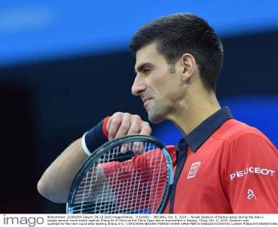 (151008) -- BEIJING, Oct. 8, 2015 -- Novak Djokovic of Serbia reacts during the men s singles second round match against Zhang Ze of China at the China Open tennis tournament in Beijing, China, Oct. 8, 2015. Djokovic was qualified for the next round after beating Zhang 2-0. ) (SP)CHINA-BEIJING-TENNIS-CHINA OPEN-MEN S SINGLES-DJOKOVIC LixWen 
