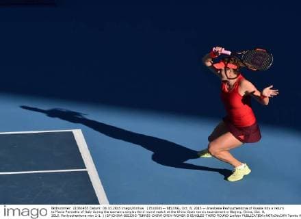 (151008) -- BEIJING, Oct. 8, 2015 -- Anastasia Pavlyuchenkova of Russia hits a return to Flavia Pennetta of Italy during the women s singles third round match at the China Open tennis tournament in Beijing, China, Oct. 8, 2015. Pavlyuchenkova won 2-1. ) (SP)CHINA-BEIJING-TENNIS-CHINA OPEN-WOMEN S SINGLES-THIRD ROUND LixWen 
