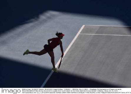 (151008) -- BEIJING, Oct. 8, 2015 -- Anastasia Pavlyuchenkova of Russia serves to Flavia Pennetta of Italy during the women s singles third round match at the China Open tennis tournament in Beijing, China, Oct. 8, 2015. Pavlyuchenkova won 2-1. ) (SP)CHINA-BEIJING-TENNIS-CHINA OPEN-WOMEN S SINGLES-THIRD ROUND LixWen 