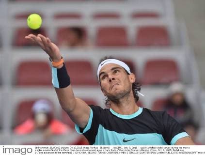 (151009) -- BEIJING, Oct. 9, 2015 -- Spain s Rafael Nadal serves during the men s singles quarterfinal of the China Open tennis tournament against Jack Sock of the United States in Beijing, China, Oct. 9, 2015. Nadal won 2-1 and advanced to the semifinal. ) (SP)CHINA-BEIJING-TENNIS-CHINA OPEN-MEN S SINGLES-QUARTERFINAL LixWen 
