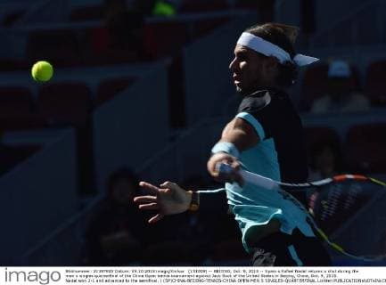 (151009) -- BEIJING, Oct. 9, 2015 -- Spain s Rafael Nadal returns a shot during the men s singles quarterfinal of the China Open tennis tournament against Jack Sock of the United States in Beijing, China, Oct. 9, 2015. Nadal won 2-1 and advanced to the semifinal. ) (SP)CHINA-BEIJING-TENNIS-CHINA OPEN-MEN S SINGLES-QUARTERFINAL LixWen 