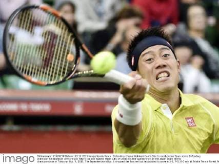 Defending champ Nishikori beats Cilic to reach Japan Open semis Defending champion Kei Nishikori stretches to return the ball against Marin Cilic of Croatia in the quarterfinals of the Japan Open tennis championships in Tokyo on Oct. 9, 2015. The Japanese world No. 6 dropped the first set but rebounded to score a 3-6, 7-5, 6-3 win at Ariake Tennis Forest Park. 
