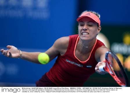 BEIJING, CHINA - OCTOBER 09: (CHINA OUT) Angelique Kerber of Germany returns a shot against Agnieszka Radwanska of Poland during the day seven of the 2015 China Open at the China National Tennis Center on October 9, 2015 in Beijing, China.  CFP474114008 