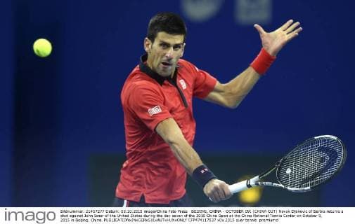BEIJING, CHINA - OCTOBER 09: (CHINA OUT) Novak Djokovic of Serbia returns a shot against John Isner of the United States during the day seven of the 2015 China Open at the China National Tennis Center on October 9, 2015 in Beijing, China.  CFP474117537 