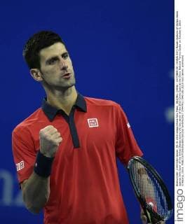 BEIJING, CHINA - OCTOBER 09: (CHINA OUT) Novak Djokovic of Serbia reacts against John Isner of the United States during the day seven of the 2015 China Open at the China National Tennis Center on October 9, 2015 in Beijing, China.  CFP474117540 