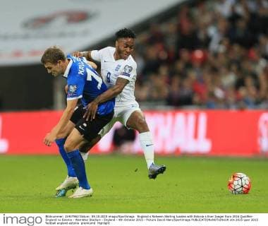 England s Raheem Sterling tussles with Estonia s Enar Jaager Euro 2016 Qualifier- England vs Estonia - Wembley Stadium - England - 9th October 2015 - Picture David Klein Sportimage EDITORIAL USE ONLY. No use with unauthorised audio, video, data, fixture lists, club league logos or live services. Online in-match use limited to 120 images, no video emulation. No use in betting, games or single club league player publications.