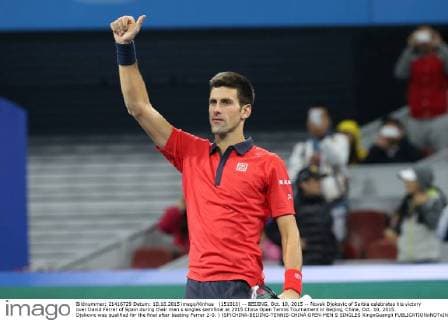 (151010) -- BEIJING, Oct. 10, 2015 -- Novak Djokovic of Serbia celebrates his victory over David Ferrer of Spain during their men s singles semifinal at 2015 China Open Tennis Tournament in Beijing, China, Oct. 10, 2015. Djokovic was qualified for the final after beating Ferrer 2-0. ) (SP)CHINA-BEIJING-TENNIS-CHINA OPEN-MEN S SINGLES XingxGuangli 