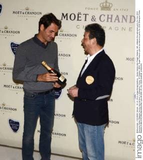 Swiss tennis star Roger Federer, left, attends the welcome party for the 2015 Shanghai Rolex Masters tennis tournament in Shanghai, China, 10 October 2015. Roger Federer glams up welcome party for 2015 Shanghai Rolex Masters  pbu343202_03