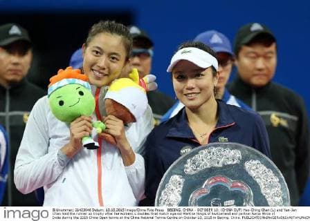 BEIJING, CHINA - OCTOBER 10: (CHINA OUT) Hao-Ching Chan (L) and Yun-Jan Chan hold the runner up trophy after the women s doubles final match against Martina Hingis of Switzerland and partner Sania Mirza of India during the 2015 China Open tennis at the China National Tennis Centre on October 10, 2015 in Beijing, China.  CFP474184498 