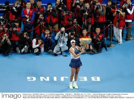 (151011) -- BEIJING, Oct. 11, 2015 -- Garbine Muguruza of Spain displays her champion trophy during the awarding ceremony for the women s singles final at 2015 China Open Tennis Tournament in Beijing, China, Oct. 11, 2015. Muguruza claimed the title of the event after beating Timea Bacsinszky of Switzerland 2-0. ) (SP)CHINA-BEIJING-TENNIS-CHINA OPEN-WOMEN S SINGLES-FINAL WangxLili 