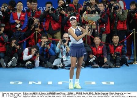 (151011) -- BEIJING, Oct. 11, 2015 -- Garbine Muguruza of Spain displays her champion trophy during the awarding ceremony for the women s singles final at 2015 China Open Tennis Tournament in Beijing, China, Oct. 11, 2015. Muguruza claimed the title of the event after beating Timea Bacsinszky of Switzerland 2-0. Xing Guangli) (SP)CHINA-BEIJING-TENNIS-CHINA OPEN-WOMEN S SINGLES-FINAL WangxLili 