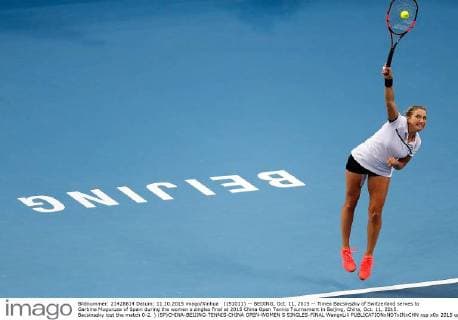 (151011) -- BEIJING, Oct. 11, 2015 -- Timea Bacsinszky of Switzerland serves to Garbine Muguruza of Spain during the women s singles final at 2015 China Open Tennis Tournament in Beijing, China, Oct. 11, 2015. Bacsinszky lost the match 0-2. ) (SP)CHINA-BEIJING-TENNIS-CHINA OPEN-WOMEN S SINGLES-FINAL WangxLili 
