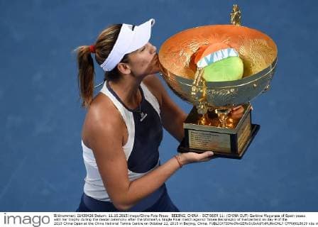 BEIJING, CHINA - OCTOBER 11: (CHINA OUT) Garbine Muguruza of Spain poses with her trophy during the medal ceremony after the Women s Single Final match against Timea Bacsinszky of Switzerland on day 9 of the 2015 China Open at the China National Tennis Centre on October 11, 2015 in Beijing, China.  CFP66018629 