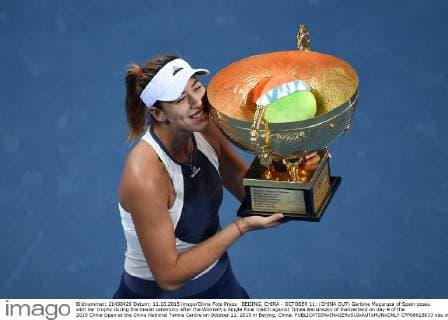 BEIJING, CHINA - OCTOBER 11: (CHINA OUT) Garbine Muguruza of Spain poses with her trophy during the medal ceremony after the Women s Single Final match against Timea Bacsinszky of Switzerland on day 9 of the 2015 China Open at the China National Tennis Centre on October 11, 2015 in Beijing, China.  CFP66018633 