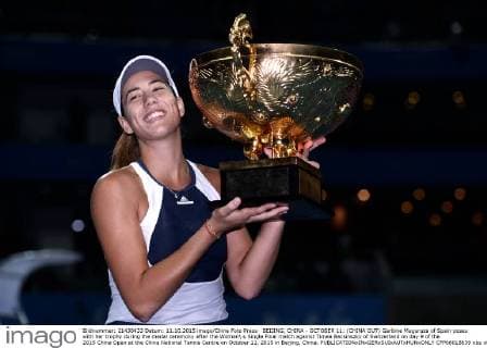 BEIJING, CHINA - OCTOBER 11: (CHINA OUT) Garbine Muguruza of Spain poses with her trophy during the medal ceremony after the Women s Single Final match against Timea Bacsinszky of Switzerland on day 9 of the 2015 China Open at the China National Tennis Centre on October 11, 2015 in Beijing, China.  CFP66018639 