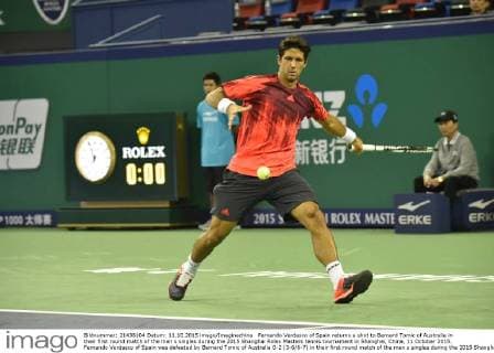 Fernando Verdasco of Spain returns a shot to Bernard Tomic of Australia in their first round match of the men s singles during the 2015 Shanghai Rolex Masters tennis tournament in Shanghai, China, 11 October 2015. Fernando Verdasco of Spain was defeated by Bernard Tomic of Australia 0-2 (3-6 6-7) in their first round match of the men s singles during the 2015 Shanghai Rolex Masters tennis tournament in Shanghai, China, 11 October 2015. Fernando Verdasco ousted by Bernard Tomic at Shanghai Rolex Masters  20151011_33551