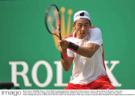 Zhang Ze of China returns a shot to Martin Klizan of Slovakia in their first round match of the men s singles during the 2015 Shanghai Rolex Masters tennis tournament in Shanghai, China, 12 October 2015. Martin Klizan defeated Zhang Ze of China 2-0 (7-6 6-2) in their first round match of the men s singles during the 2015 Shanghai Rolex Masters tennis tournament in Shanghai, China, 12 October 2015. Martin Klizan ousts Zhang Ze at Shanghai Rolex Masters  pbu343943_14