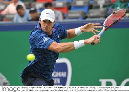 John Isner of the United States returns a shot to Adrian Mannarino of France in their first round match of the men s singles during the 2015 Shanghai Rolex Masters tennis tournament in Shanghai, China, 12 October 2015. John Isner of the United States defeated Adrian Mannarino of France 2-0 (6-1 6-2) in their first round match of the men s singles during the 2015 Shanghai Rolex Masters tennis tournament in Shanghai, China, 12 October 2015. Nick Kyrgios knocks out Andreas Haider-Maurer at Shanghai Rolex Masters  pbu344019_14