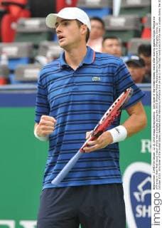 John Isner of the United States reacts after scoring against Adrian Mannarino of France in their first round match of the men s singles during the 2015 Shanghai Rolex Masters tennis tournament in Shanghai, China, 12 October 2015. John Isner of the United States defeated Adrian Mannarino of France 2-0 (6-1 6-2) in their first round match of the men s singles during the 2015 Shanghai Rolex Masters tennis tournament in Shanghai, China, 12 October 2015. Nick Kyrgios knocks out Andreas Haider-Maurer at Shanghai Rolex Masters  pbu344019_16