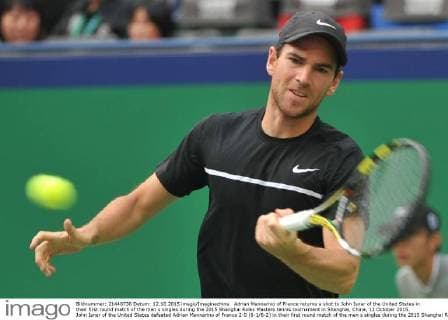 Adrian Mannarino of France returns a shot to John Isner of the United States in their first round match of the men s singles during the 2015 Shanghai Rolex Masters tennis tournament in Shanghai, China, 12 October 2015. John Isner of the United States defeated Adrian Mannarino of France 2-0 (6-1 6-2) in their first round match of the men s singles during the 2015 Shanghai Rolex Masters tennis tournament in Shanghai, China, 12 October 2015. Nick Kyrgios knocks out Andreas Haider-Maurer at Shanghai Rolex Masters  pbu344018_06