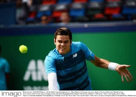 Milos Raonic of Canada returns a shot to Thomaz Bellucci of Brazil in their first round match of the men s singles during the 2015 Shanghai Rolex Masters tennis tournament in Shanghai, China, 13 October 2015. Milos Raonic of Canada defeated Thomaz Bellucci of Brazil 2-0 (7-6 7-6) in their first round match of the men s singles during the 2015 Shanghai Rolex Masters tennis tournament in Shanghai, China, 13 October 2015. Milos Raonic ousts Thomaz Bellucci at Shanghai Rolex Masters  20151013_32183