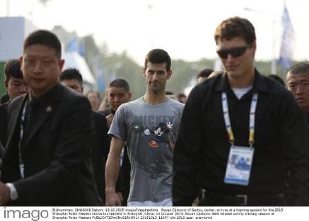 Novak Djokovic of Serbia, center, arrives at a training session for the 2015 Shanghai Rolex Masters tennis tournament in Shanghai, China, 13 October 2015. Novak Djokovic feels relaxed during training session at Shanghai Rolex Masters  20151013_11897
