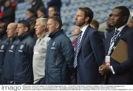 13.10.2015. Ricoh Arena, Coventry, England. U21 U 21 European Championships Qualification. England U21 versus Kazakhstan U21. The England coaching staff, led by Gareth Southgate observe their Nation Anthem. xAndyxThompsonx  ActionPlus11672121