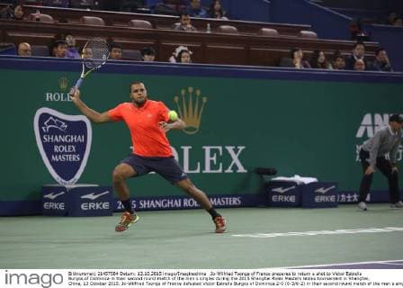 Jo-Wilfried Tsonga of France prepares to return a shot to Victor Estrella Burgos of Dominica in their second round match of the men s singles during the 2015 Shanghai Rolex Masters tennis tournament in Shanghai, China, 13 October 2015. Jo-Wilfried Tsonga of France defeated Victor Estrella Burgos of Dominica 2-0 (6-3 6-2) in their second round match of the men s singles during the 2015 Shanghai Rolex Masters tennis tournament in Shanghai, China, 13 October 2015. Jo-Wilfried Tsonga ousts Victor Estrella Burgos at Shanghai Rolex Masters  20151013_15076