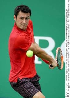 Bernard Tomic of Australia returns a shot to David Ferrer of Spain in their second round match of the men s singles during the 2015 Shanghai Rolex Masters tennis tournament in Shanghai, China, 14 October 2015. Bernard Tomic of Australia defeated David Ferrer of Spain 2-0 (6-4 6-2) in their second round match of the men s singles during the 2015 Shanghai Rolex Masters tennis tournament in Shanghai, China, 14 October 2015. David Ferrer kicked out by Bernard Tomic at Shanghai Rolex Masters  pbu344939_08