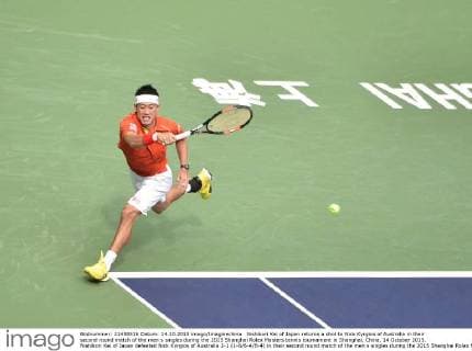 Nishikori Kei of Japan returns a shot to Nick Kyrgios of Australia in their second round match of the men s singles during the 2015 Shanghai Rolex Masters tennis tournament in Shanghai, China, 14 October 2015. Nishikori Kei of Japan defeated Nick Kyrgios of Australia 2-1 (1-6 6-4 6-4) in their second round match of the men s singles during the 2015 Shanghai Rolex Masters tennis tournament in Shanghai, China, 14 October 2015. Nishikori Kei ousts Nick Kyrgios at Shanghai Rolex Masters  20151014_09195