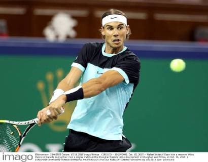 (151015) -- SHANGHAI, Oct. 15, 2015 -- Rafael Nadal of Spain hits a return to Milos Raonic of Canada during their men s singles match at the Shanghai Masters tennis tournament in Shanghai, east China, on Oct. 15, 2015. ) (SP)CHINA-SHANGHAI-TENNIS-SHANGHAI MASTERS (CN) FanxJun 