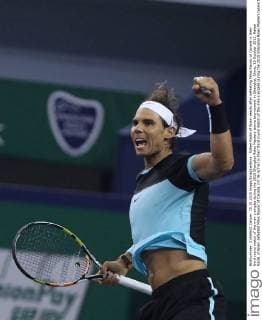 Rafael Nadal of Spain reacts after defeating Milos Raonic of Canada in their third round match of the men s singles during the 2015 Shanghai Rolex Masters tennis tournament in Shanghai, China, 15 October 2015. Rafael Nadal of Spain defeated Milos Raonic of Canada 2-0 (6-3 7-6) in their third round match of the men s singles during the 2015 Shanghai Rolex Masters tennis tournament in Shanghai, China, 15 October 2015. Rafael Nadal ousts Milos Raonic at Shanghai Rolex Masters  20151015_65950