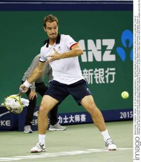 Richard Gasquet of France prepares to return a shot to Bernard Tomic of Australia in their third round match of the men s singles during the 2015 Shanghai Rolex Masters tennis tournament in Shanghai, China, 15 October 2015. Bernard Tomic of Australia defeated Richard Gasquet of France 2-1 (6-3 6-7 6-4) in their third round match of the men s singles during the 2015 Shanghai Rolex Masters tennis tournament in Shanghai, China, 15 October 2015. Bernard Tomic defeats Richard Gasquet at Shanghai Rolex Masters  20151015_51063