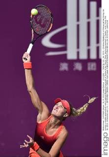 (151016) -- TIANJIN, Oct. 16, 2015 -- Kristina Mladenovic of France serves during the women s singles quarterfinal match against Bojana Jovanovski of Serbia at the Tianjin Open tennis tournament in Tianjin, north China, Oct. 16, 2015. Jovanovski won 2-1. ) (SP)CHINA-TIANJIN-TENNIS YuexYuewei 