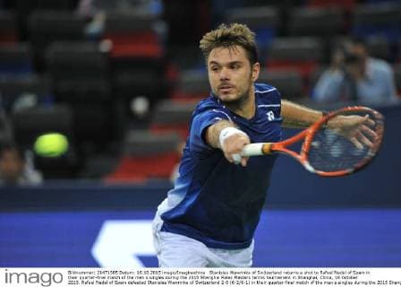 Stanislas Wawrinka of Switzerland returns a shot to Rafael Nadal of Spain in their quarter-final match of the men s singles during the 2015 Shanghai Rolex Masters tennis tournament in Shanghai, China, 16 October 2015. Rafael Nadal of Spain defeated Stanislas Wawrinka of Switzerland 2-0 (6-2 6-1) in their quarter-final match of the men s singles during the 2015 Shanghai Rolex Masters tennis tournament in Shanghai, China, 16 October 2015. Rafael Nadal ousts Stanislas Wawrinka to advance to semi-final at Shanghai Rolex Masters  pbu346245_01