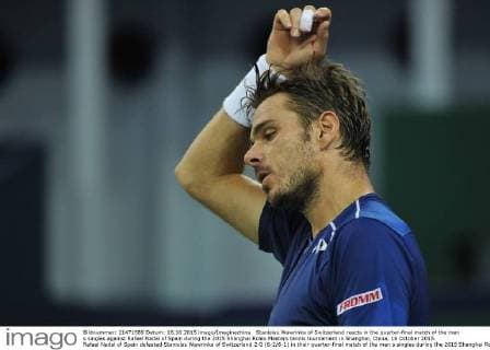 Stanislas Wawrinka of Switzerland reacts in the quarter-final match of the men s singles against Rafael Nadal of Spain during the 2015 Shanghai Rolex Masters tennis tournament in Shanghai, China, 16 October 2015. Rafael Nadal of Spain defeated Stanislas Wawrinka of Switzerland 2-0 (6-2 6-1) in their quarter-final match of the men s singles during the 2015 Shanghai Rolex Masters tennis tournament in Shanghai, China, 16 October 2015. Rafael Nadal ousts Stanislas Wawrinka to advance to semi-final at Shanghai Rolex Masters  pbu346245_10