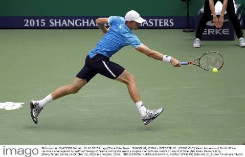 SHANGHAI, CHINA - OCTOBER 16: (CHINA OUT) Kevin Anderson of South Africa returns a shot against Jo-Wilfried Tsonga of France during the men s singles quarterfinals match on day 6 of Shanghai Rolex Masters at Qi Zhong Tennis Centre on October 16, 2015 in Shanghai, China.  CFP474431056 